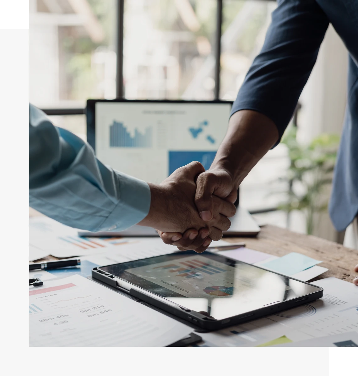 Two professionals shaking hands